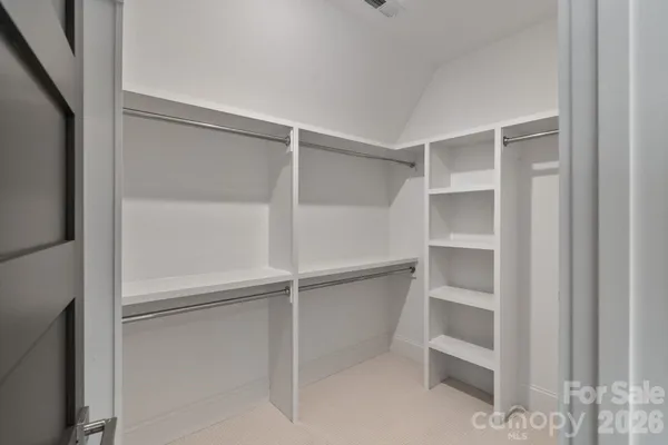 a bathroom with a sink and a window