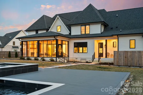a view of a house with a swimming pool