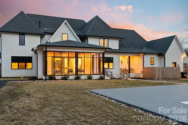 an aerial view of a house with swimming pool