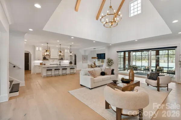 a living room with furniture and a table