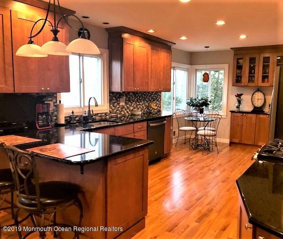 131 Lancaster Road Freehold, NJ 07728 - Photo 42 of 42 Updated open floor plan kitchen
