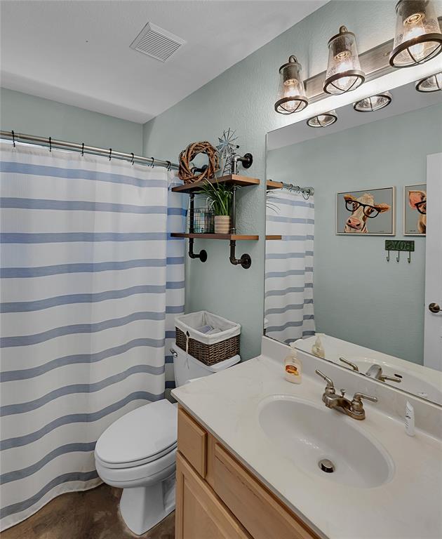 37 Bluebonnet Loop Morgan's Point Resort, TX 76513 - Photo 25 of 38 Bathroom featuring a single vanity with a white countertop, oval sink, and chrome faucet