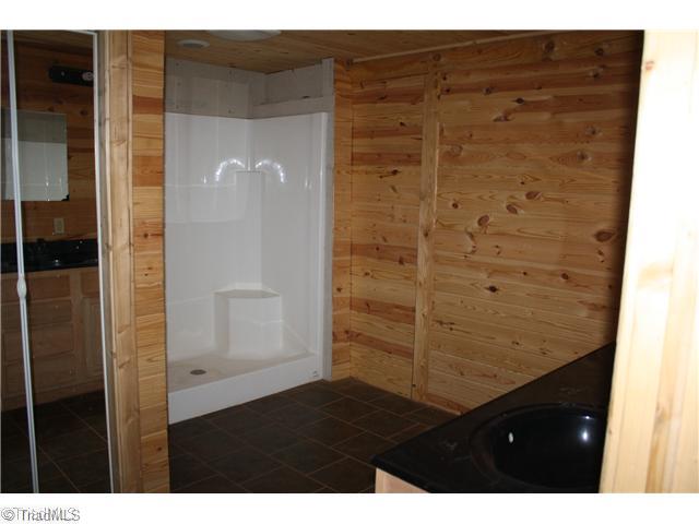 544 Reely Cook Road Dobson, NC 27017 - Photo 8 of 16 Master Bath/Spa. Master Bath with shower and jetted tub.