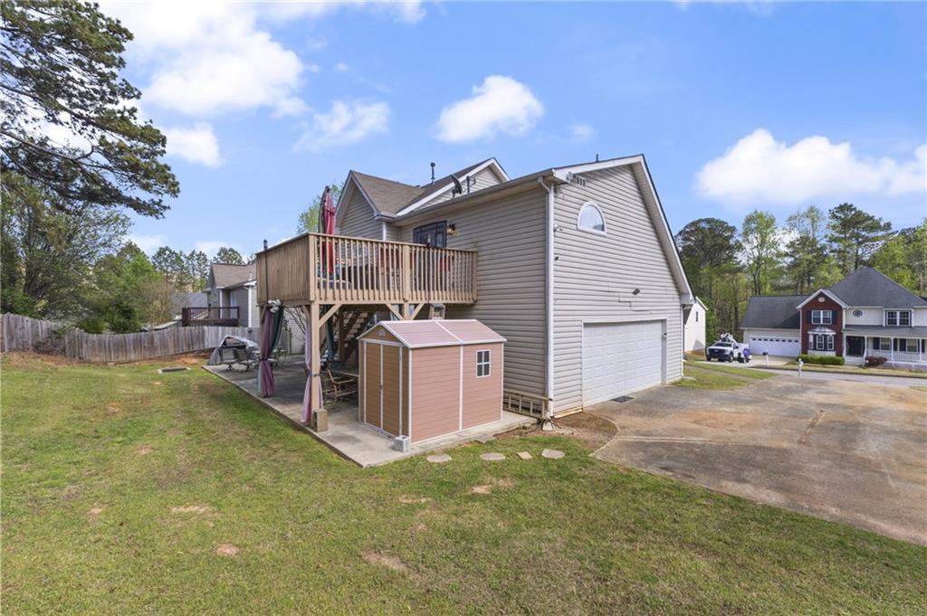 4008 Lindsey Lane Rex, GA 30273 - Photo 33 of 34 a view of a house with a yard