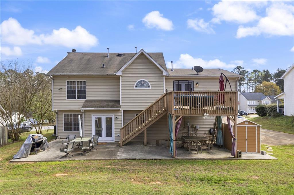 4008 Lindsey Lane Rex, GA 30273 - Photo 34 of 34 a house view with a swimming pool and sitting space