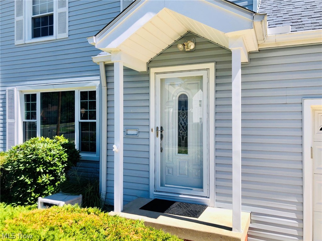 1375 Grantleigh Road Cleveland, OH 44121 - Photo 2 of 2 Inviting front door and porch. Brand new door, storm door, and hardware! Very nice!
