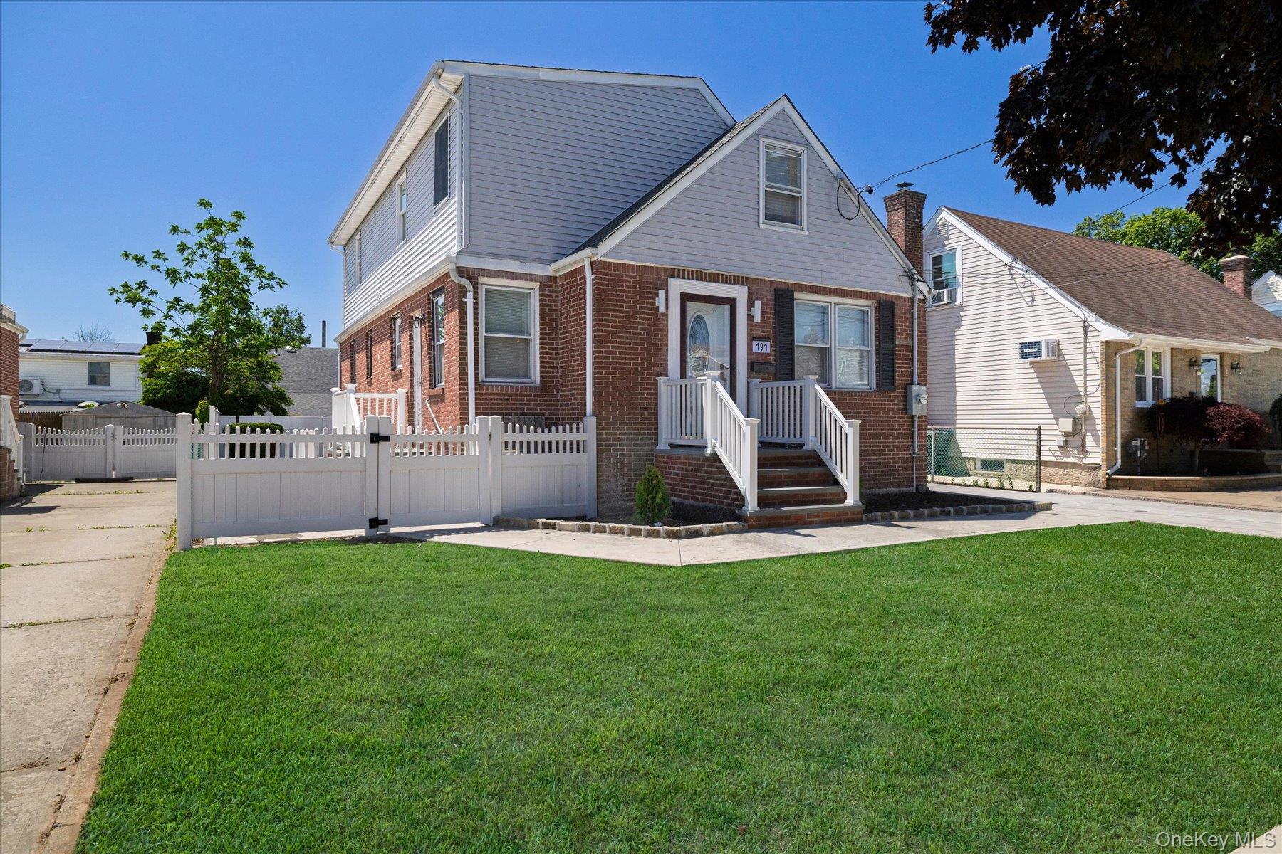 a front view of house with yard