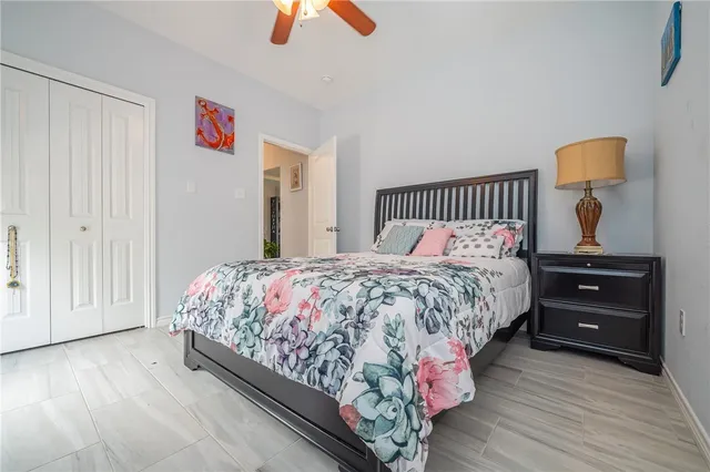 a bedroom with a bed and a dresser