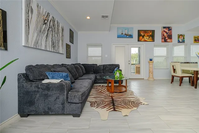 a living room with furniture and a couch