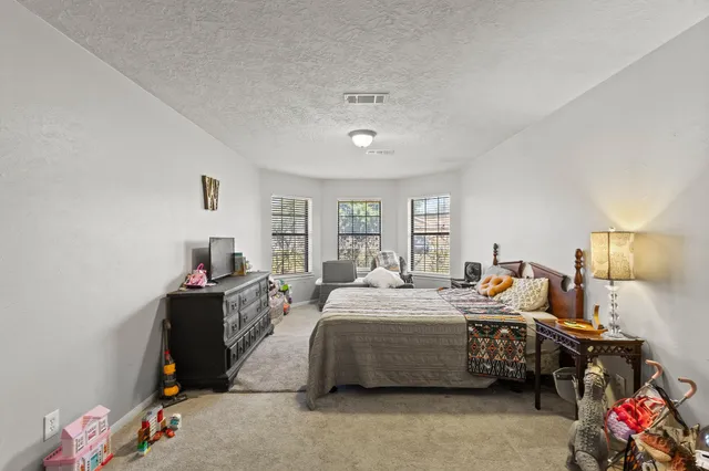 a view of a workspace with furniture