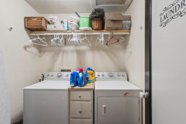 a swimming pool with some trees in the background