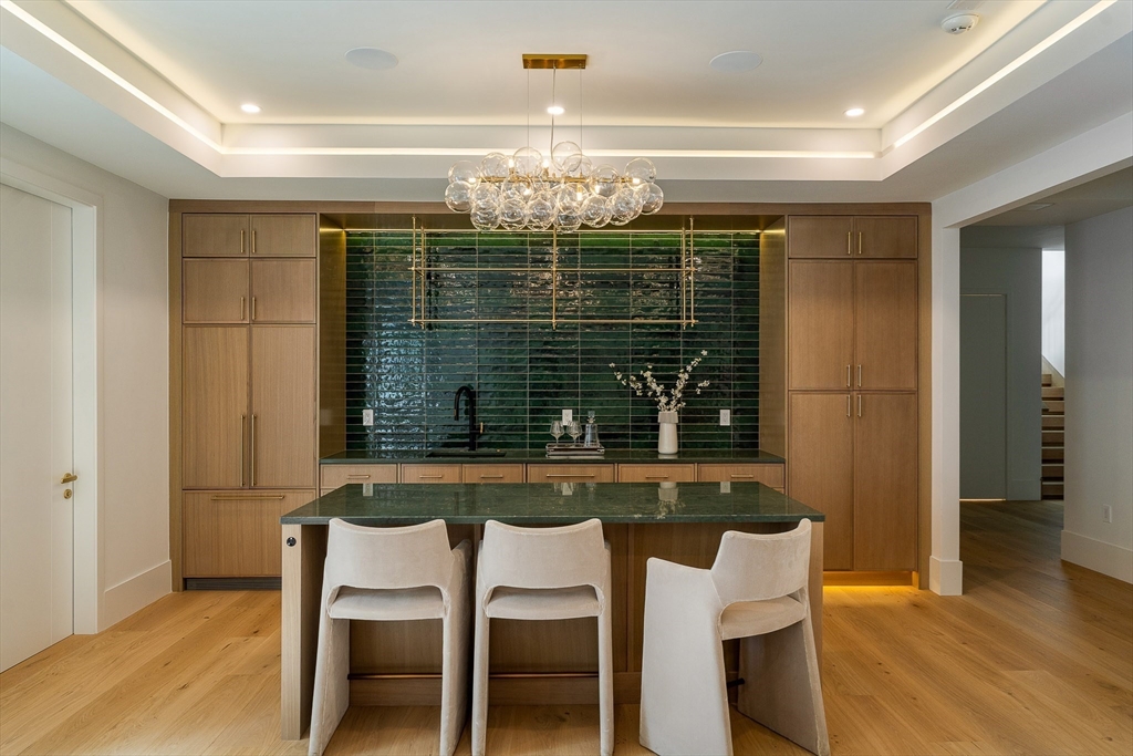 19 Bonnybrook Road Newton, MA 02468 - Photo 35 of 42 a view of a dining room with furniture and wooden floor