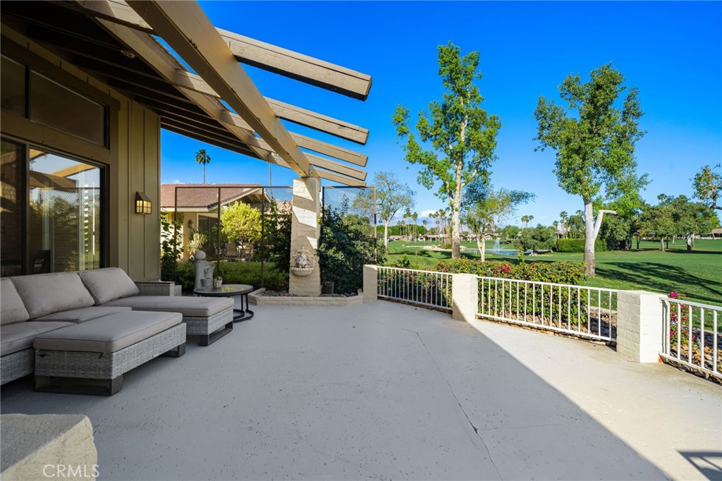 120 Old Ranch Road Palm Desert, CA 92211 - Photo 29 of 50 Expansive Patio with Double Fairwy and Water Views