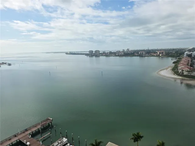 a view of a balcony with an ocean
