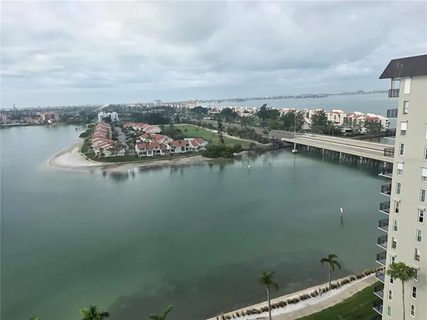 an aerial view of a house swimming pool patio and outdoor seating