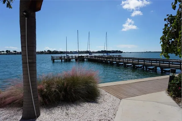 a view of a dining area with furniture and wooden floor