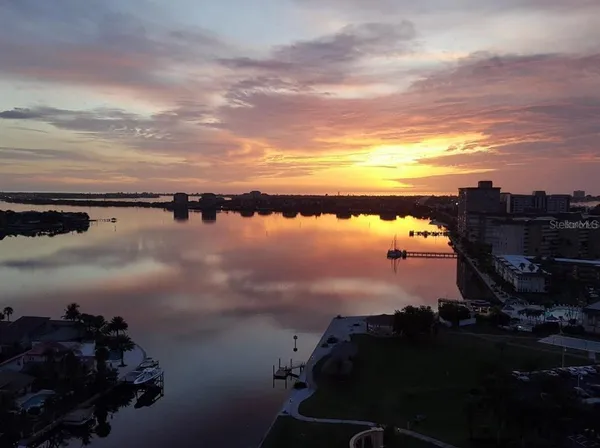 a living room with furniture a table and chairs