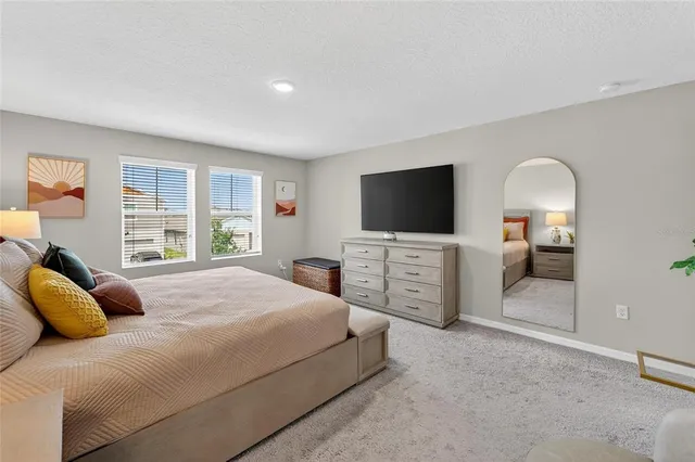 a workspace with furniture and a window