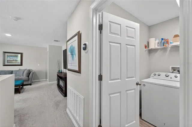 a view of a swimming pool with a lounge chairs