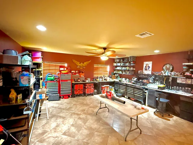 a bathroom with a toilet and shower