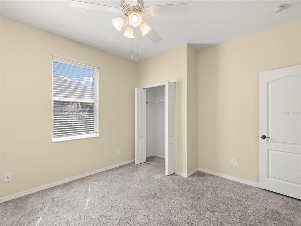 7935 Calindra Court Trinity, FL 34655 - Photo 23 of 52 a view of an empty room with a window
