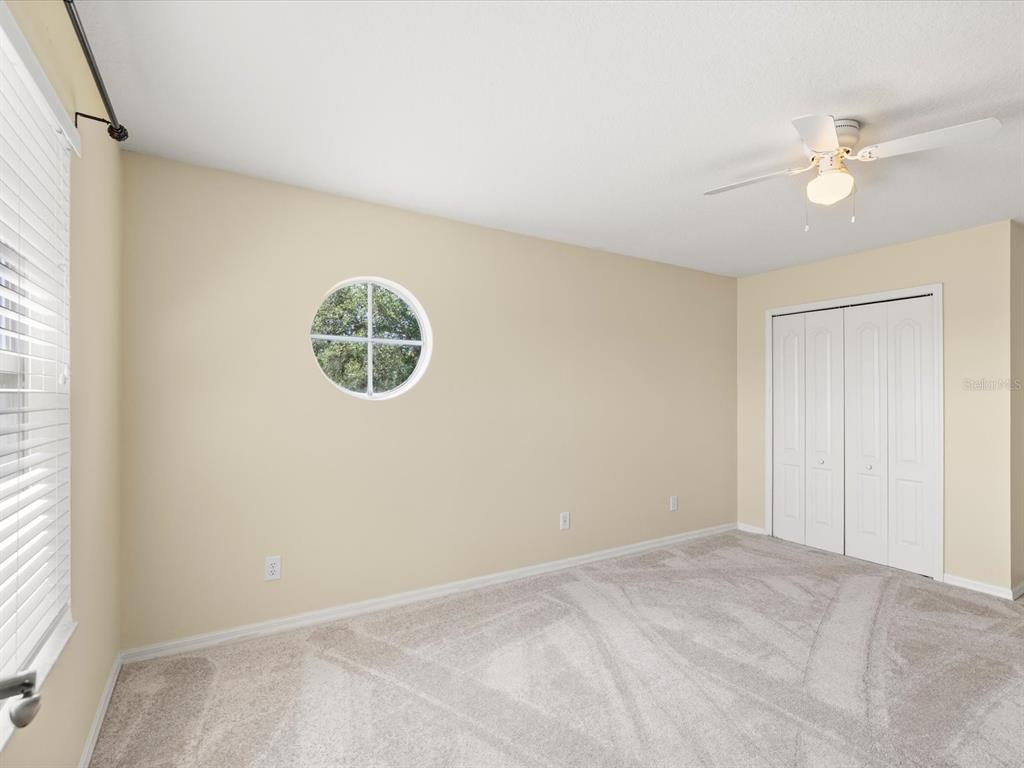7935 Calindra Court Trinity, FL 34655 - Photo 32 of 52 an empty room with window