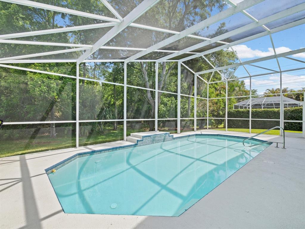 7935 Calindra Court Trinity, FL 34655 - Photo 37 of 52 a view of a tennis court