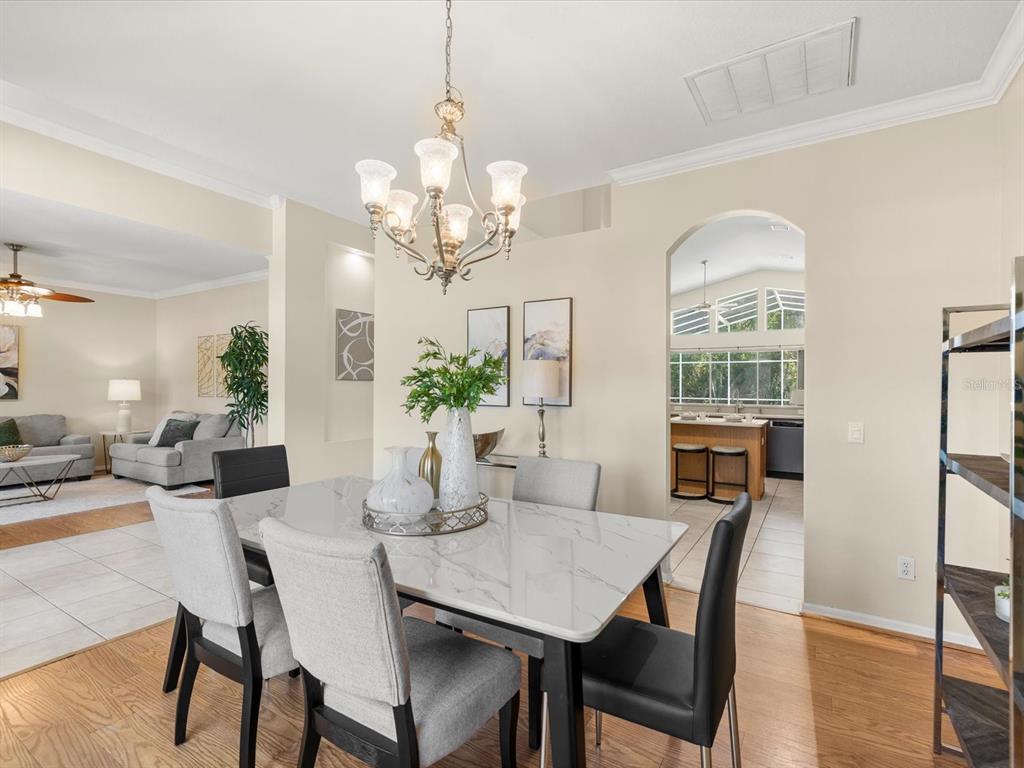 7935 Calindra Court Trinity, FL 34655 - Photo 7 of 52 a view of a dining room with furniture window and outside view