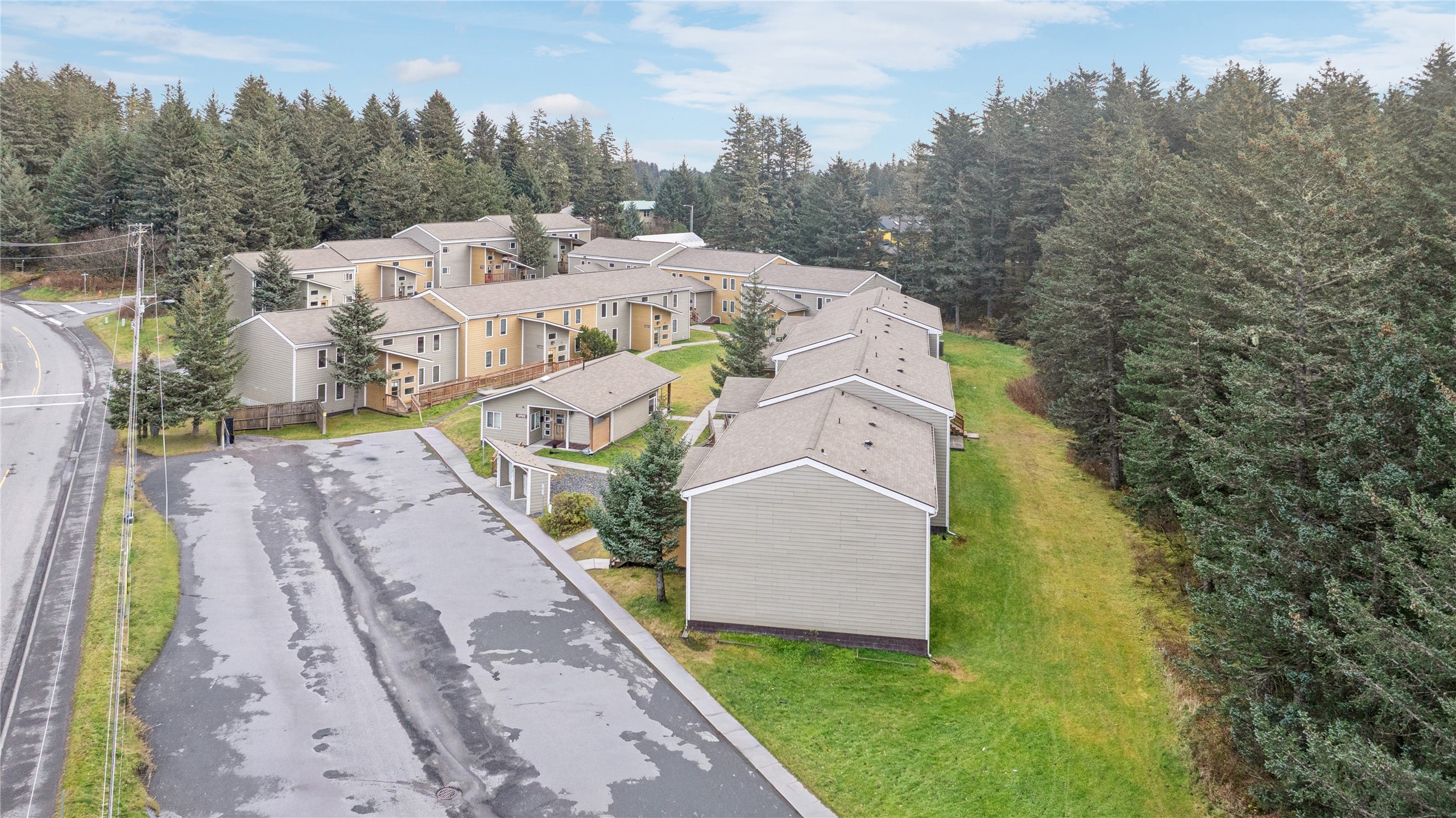 2610 Mill Bay Road Other, AK 99615 - Photo 12 of 50 a view of a house with a yard