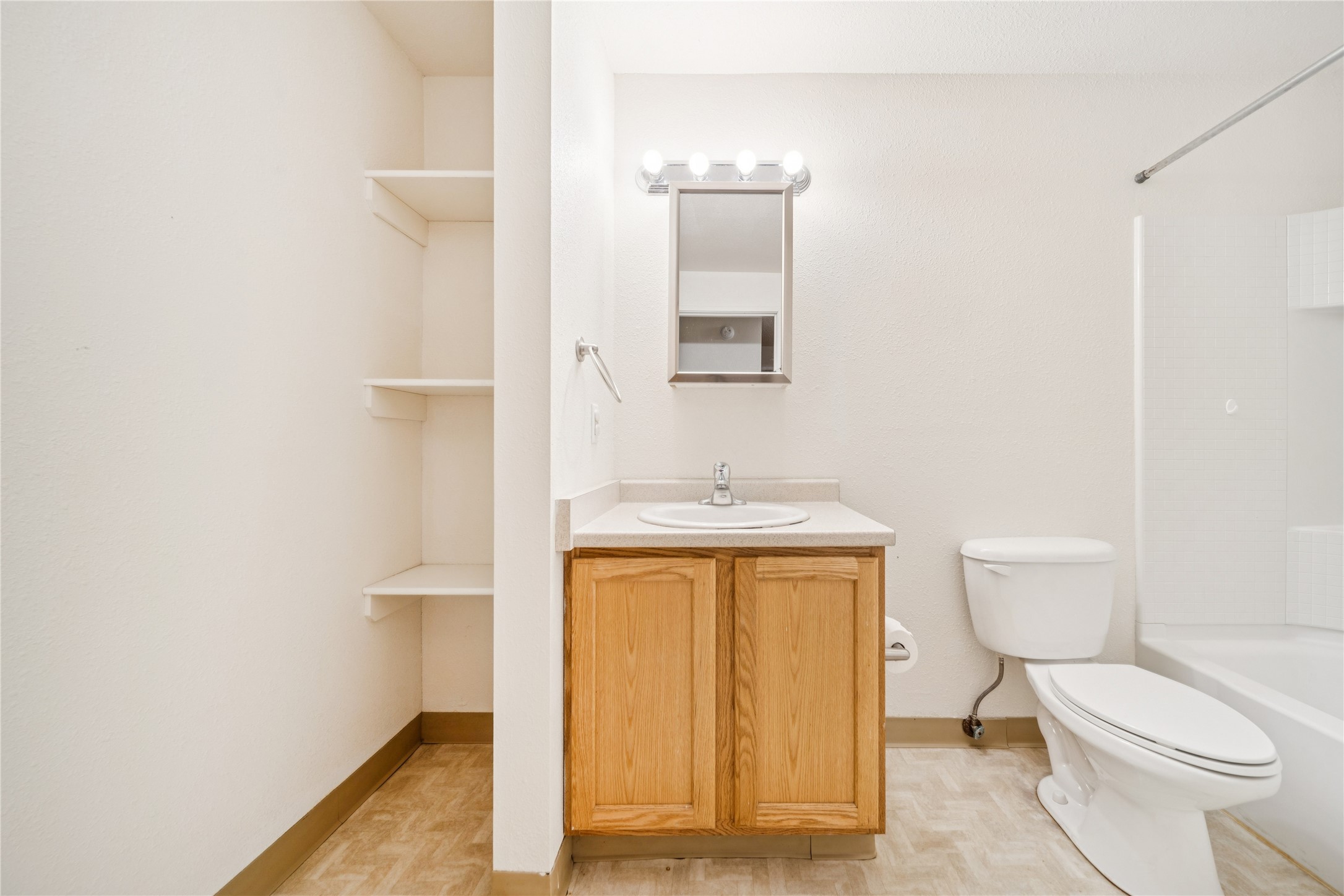 2610 Mill Bay Road Other, AK 99615 - Photo 37 of 50 a bathroom with a toilet a sink and mirror