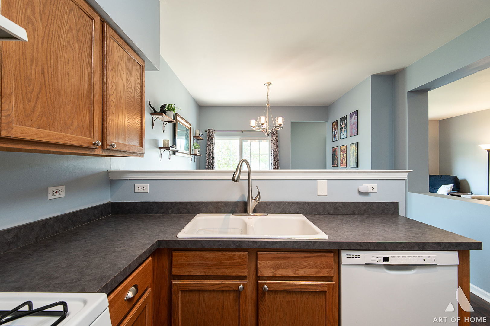 169 Braxton Lane Aurora, IL 60504 - Photo 12 of 26 a kitchen with a sink and cabinets
