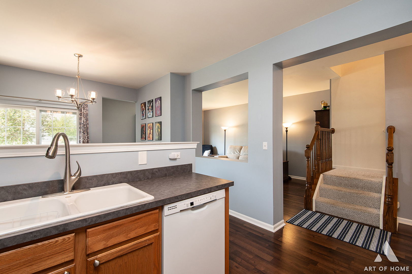 169 Braxton Lane Aurora, IL 60504 - Photo 13 of 26 a kitchen with a sink a counter space and a window