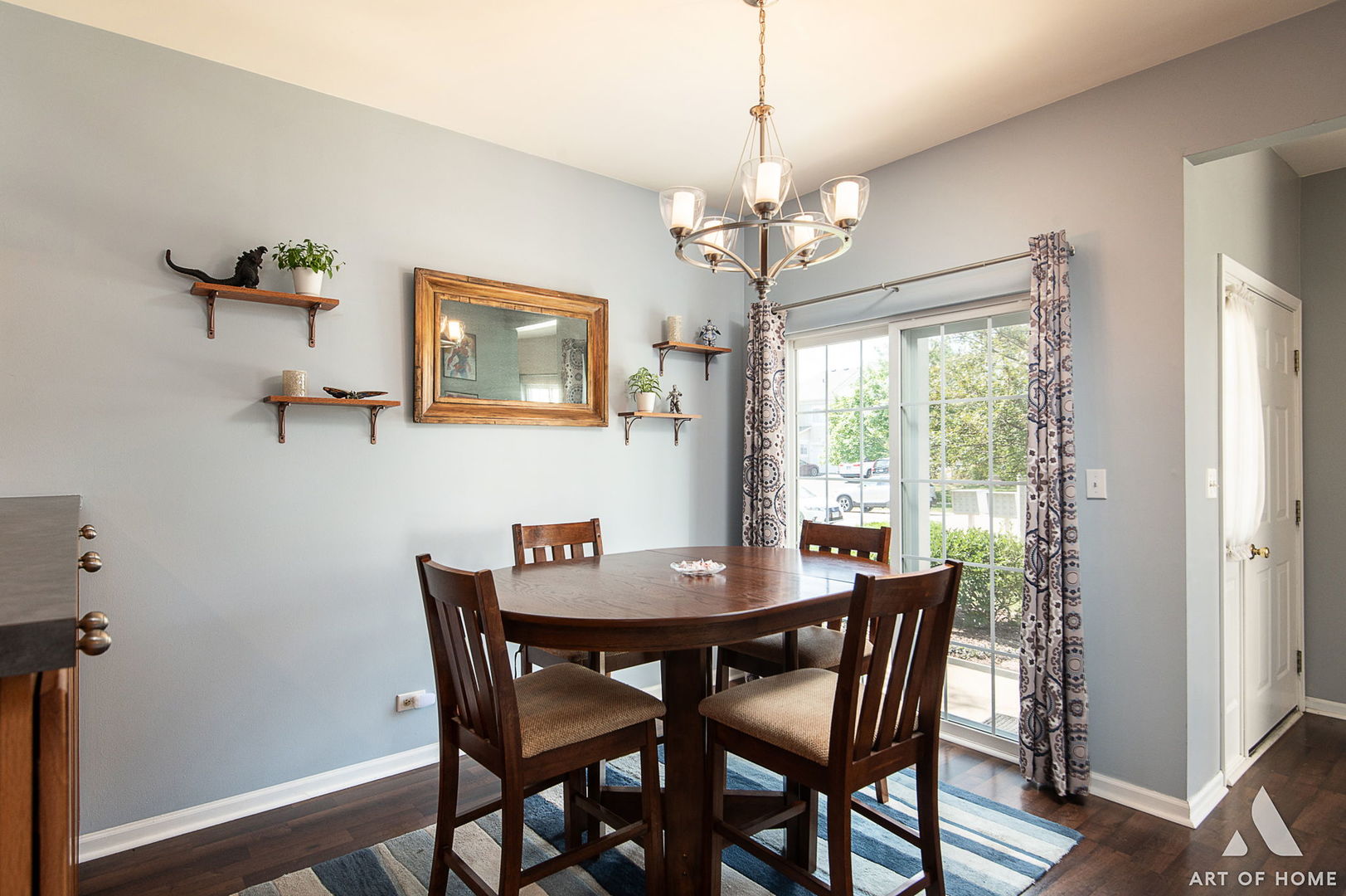 169 Braxton Lane Aurora, IL 60504 - Photo 15 of 26 a view of a dining room with furniture window and wooden floor