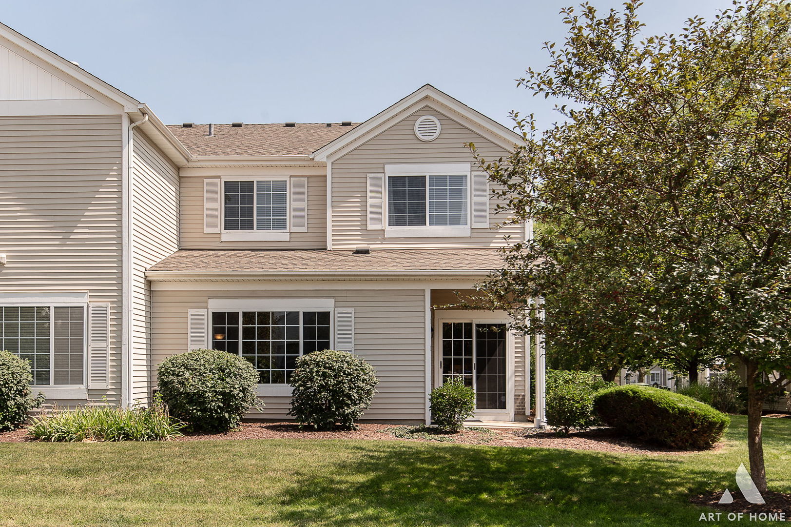 169 Braxton Lane Aurora, IL 60504 - Photo 2 of 26 a front view of a house with a yard and garage