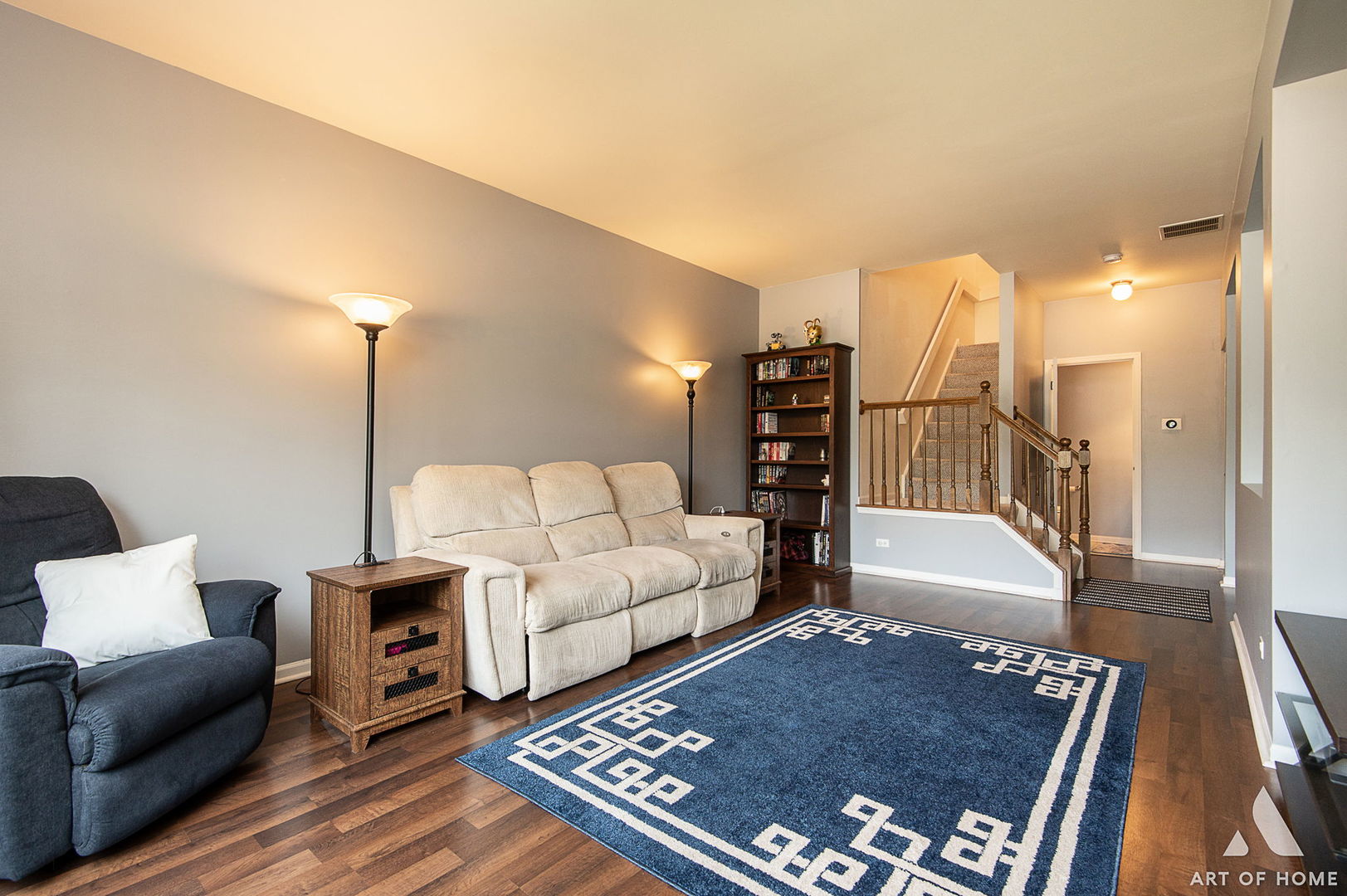 169 Braxton Lane Aurora, IL 60504 - Photo 6 of 26 a living room with furniture and a rug