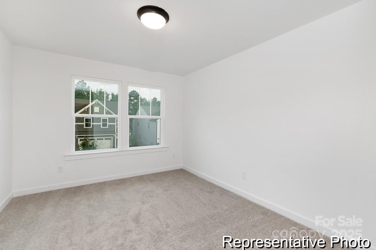 128 Peak Vw Road, Unit 5P Statesville, NC 28677 - Photo 20 of 28 an empty room with a window