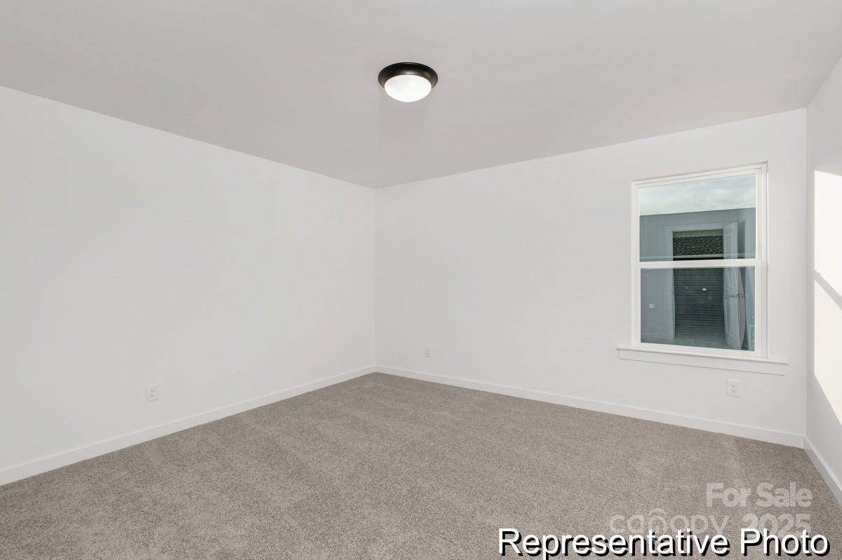 128 Peak Vw Road, Unit 5P Statesville, NC 28677 - Photo 21 of 28 a view of an empty room