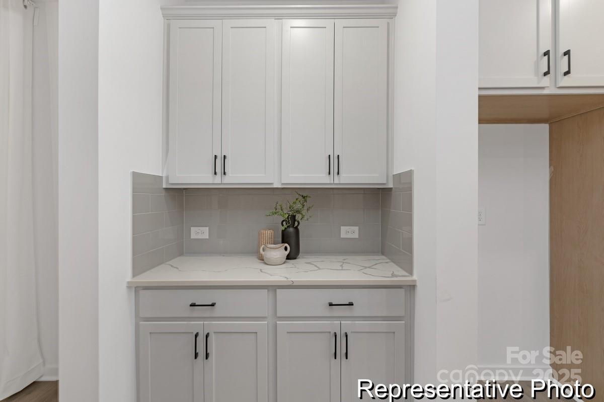 128 Peak Vw Road, Unit 5P Statesville, NC 28677 - Photo 25 of 28 a view of cabinets and wooden floor