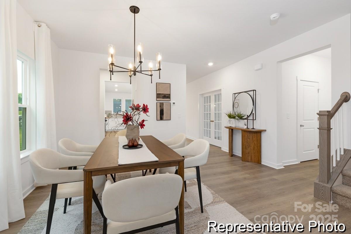 128 Peak Vw Road, Unit 5P Statesville, NC 28677 - Photo 7 of 28 a view of a dining room with furniture