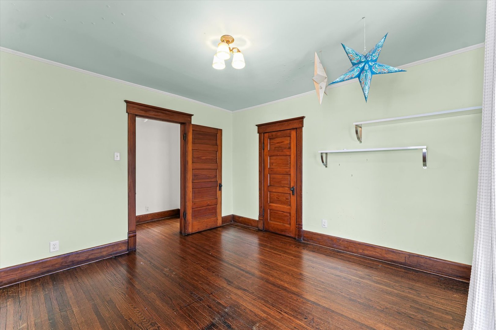 407 West High Street Urbana, IL 61801 - Photo 20 of 28 wooden floor in an empty room with a window