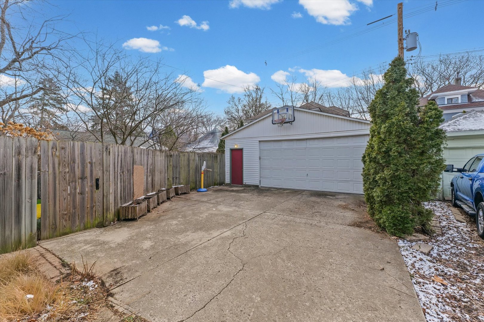 407 West High Street Urbana, IL 61801 - Photo 23 of 28 a view of a house with a yard and garage
