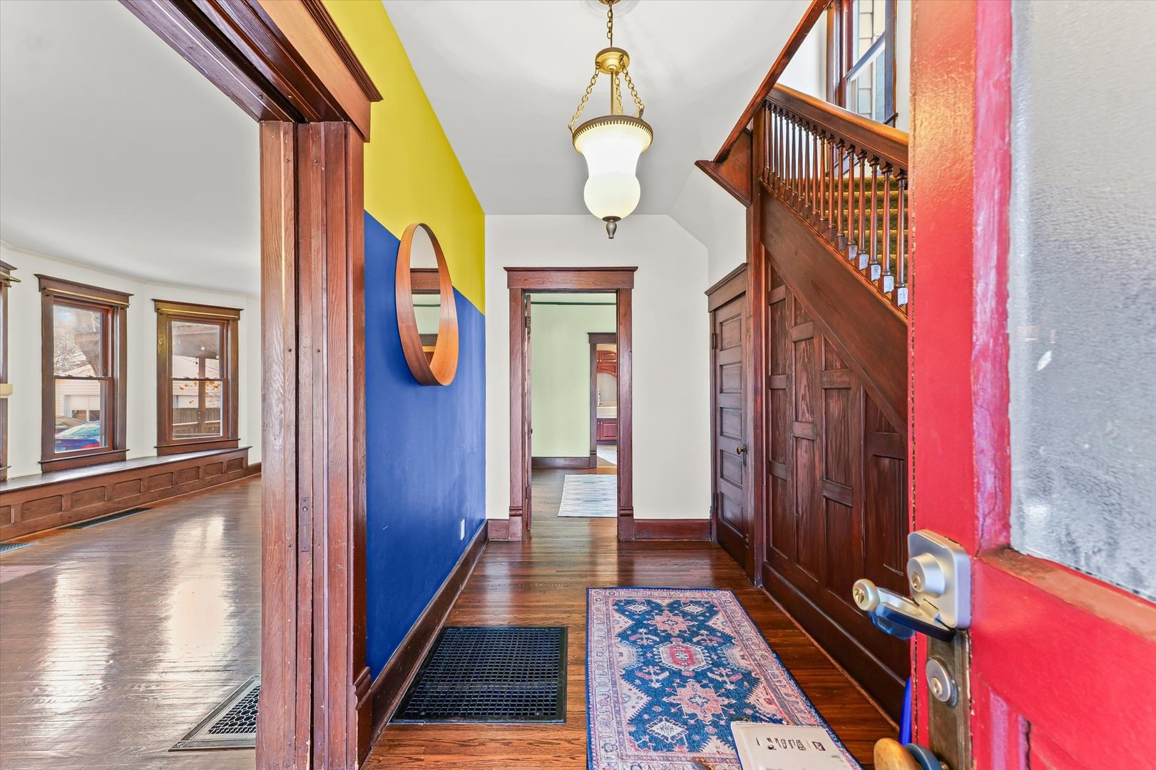 407 West High Street Urbana, IL 61801 - Photo 3 of 28 a view of an entryway with wooden floor