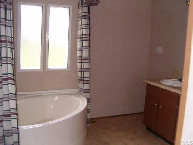 1206 Massenburg Road Henderson, NC 27537 - Photo 3 of 10 MASTER BATHROOM