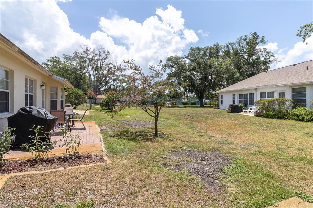 9052 Arundle Place New Port Richey, FL 34655 - Photo 25 of 57 a house with trees in the background