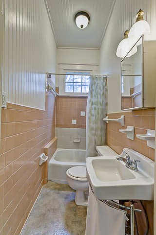 210 5th Avenue South, Unit 2 Franklin, TN 37064 - Photo 11 of 21 a bathroom with a sink a toilet and shower