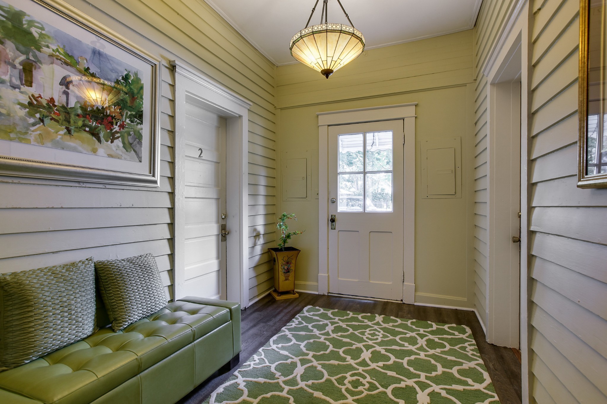 210 5th Avenue South, Unit 2 Franklin, TN 37064 - Photo 16 of 21 a living room with furniture and a table