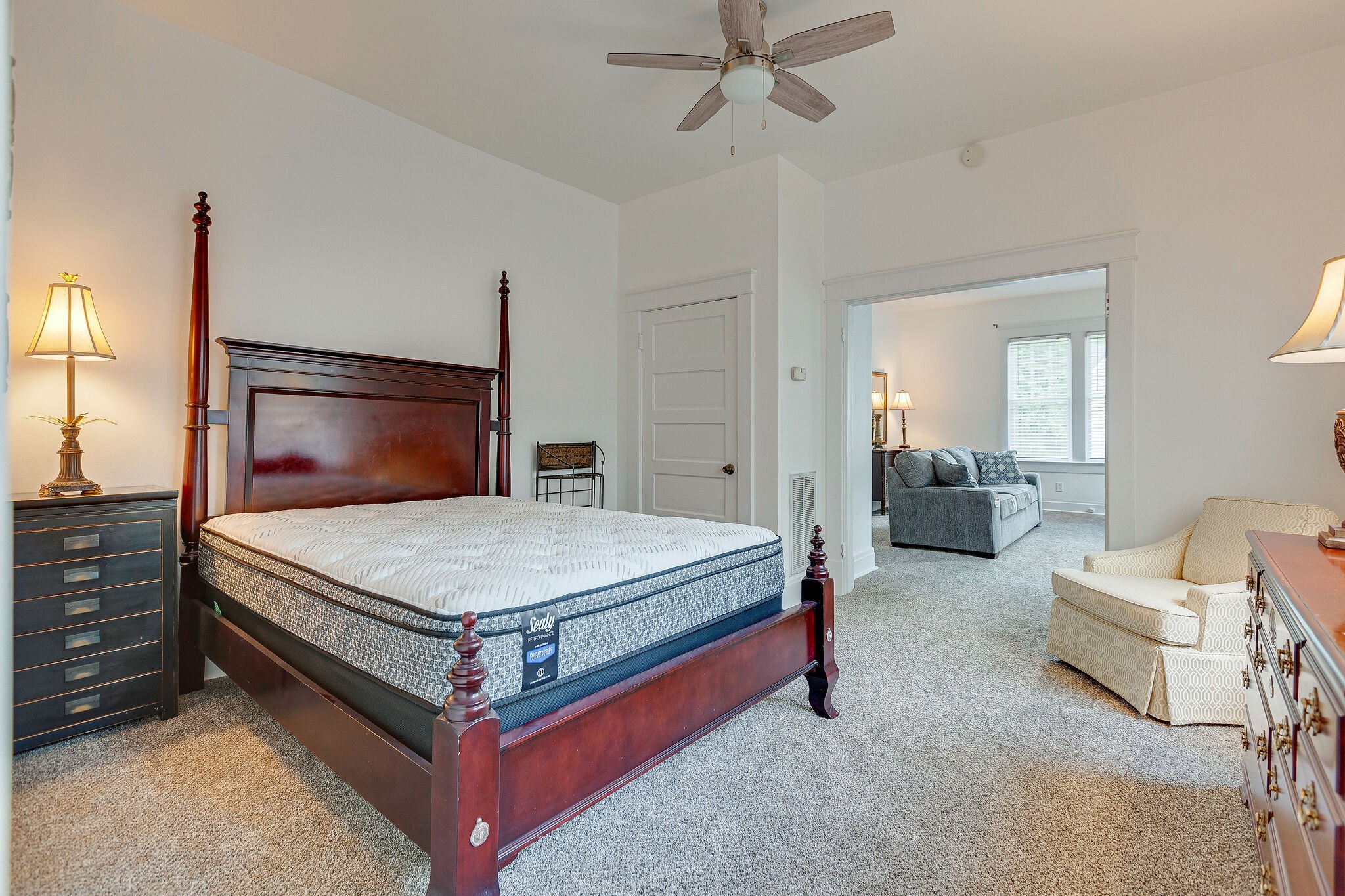 210 5th Avenue South, Unit 2 Franklin, TN 37064 - Photo 9 of 21 a bedroom with a bed and a chandelier