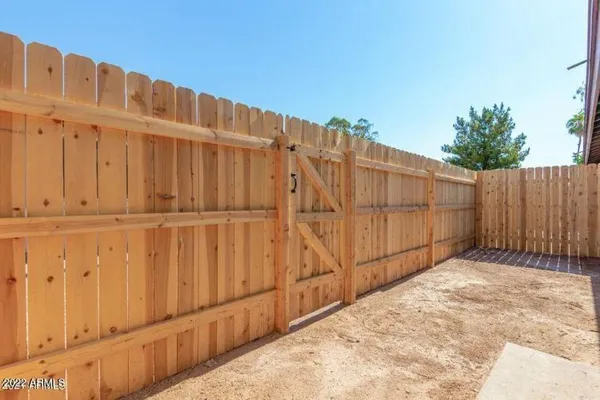 a view of a wooden fence