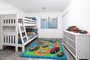 a room with toys and a baby crib
