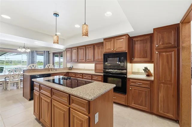 a living room with a bed furniture and a window